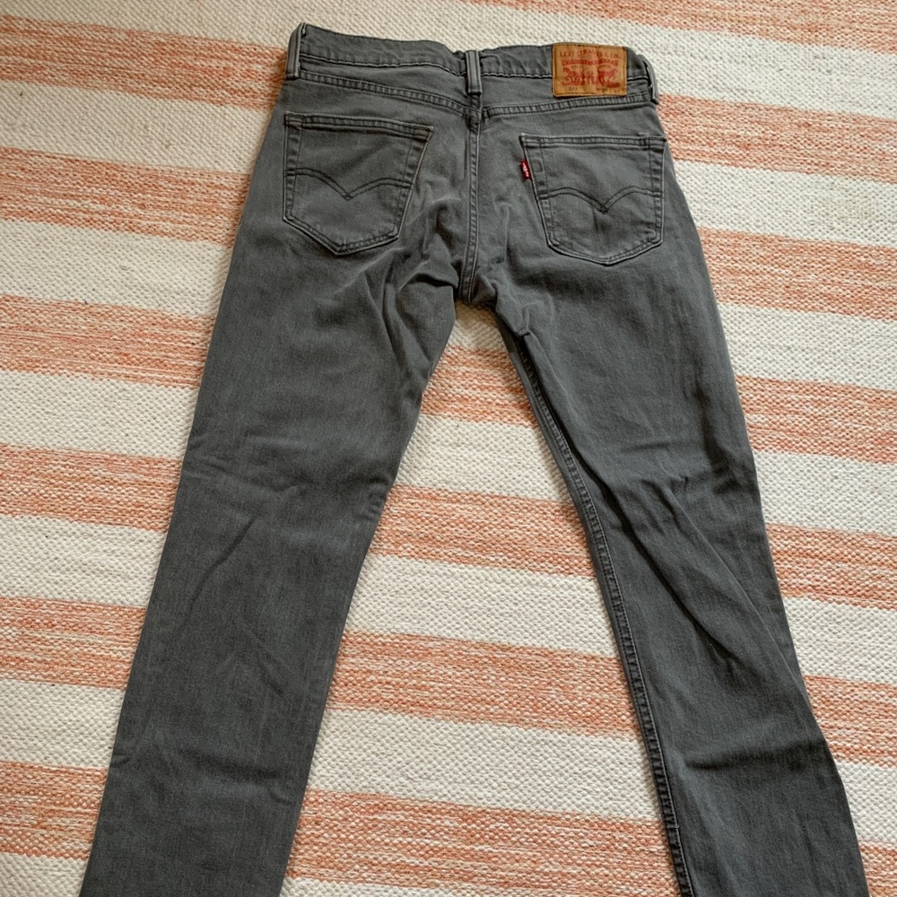 Levi’s 511 grey jeans.